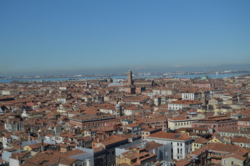 Fototapeta na wymiar Aerial Views From The Campanile Tower On The Rooftops Of Venetian Style Buildings In Venice. Travel, Holidays, Architecture. March 27, 2015. Venice, Region Of Veneto, Italy.