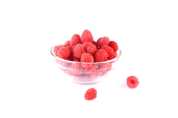 raspberry in bowl isolated on white background