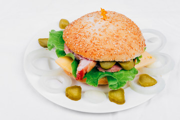 Tasty European snack hamburger sesame bun with ham 