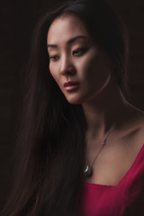 Fototapeta premium Closeup studio portrait of beautiful Asian woman