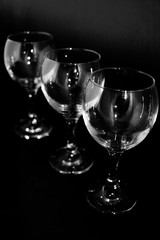 Empty wine glass on a black background