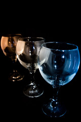 Empty wine glass on a black background