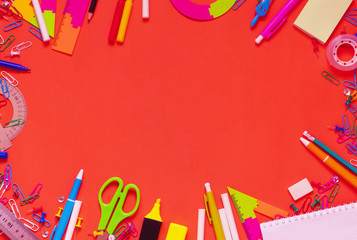 School supplies on colorful background