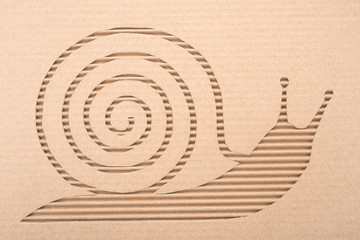  Snail cut out on a corrugated cardboard  © slava