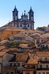 Fototapeta na wymiar Casario colonial e Igreja de Santa ifigênia, Ouro Preto, Brasil