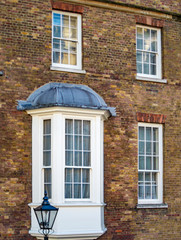 Fototapeta na wymiar A victorian window of an old building in london