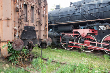 Fototapeta na wymiar An old and historic steam locomotive and wagon