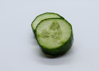 The isolated slices of cucumber