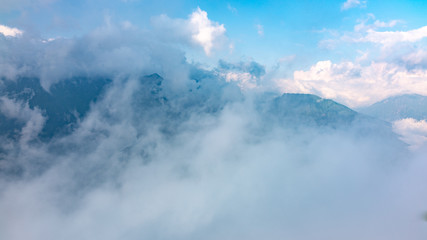 Fototapeta na wymiar Clouds over mountains