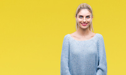 Fototapeta premium Young beautiful blonde and blue eyes woman wearing winter sweater over isolated background with a happy and cool smile on face. Lucky person.