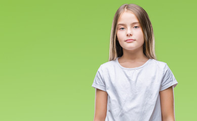 Obraz premium Young beautiful girl over isolated background with serious expression on face. Simple and natural looking at the camera.