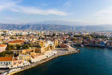 Naklejka premium Panoramic aerial view from above of the city of Chania, Crete island, Greece. Landmarks of Greece, beautiful venetian town Chania in Crete island.