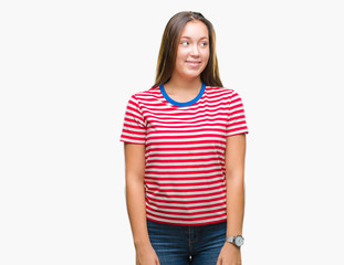 Young caucasian beautiful woman over isolated background smiling looking side and staring away thinking.