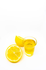 Fototapeta na wymiar A Mexican tequila shot with lemon on a white isolated background