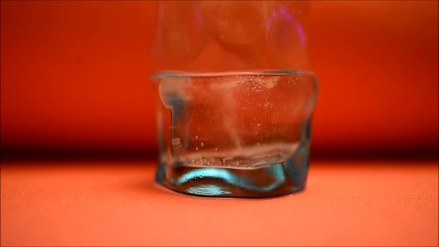 water bubbles in a glass of soda
