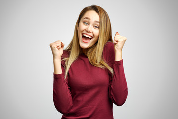 Human emotions and feelings. Happy lucky excited female winner exclaiming, rejoicing at his success...