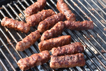 Traditional Romanian food, grilled meat rolls known as mititei