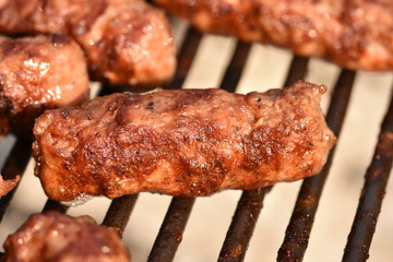 Traditional Romanian food, grilled meat rolls known as mititei