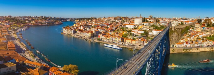 Panoramic view of Old city of Porto (Oporto) and Ribeira over Douro river, Portugal. Concept of world travel, sightseeing and tourism.