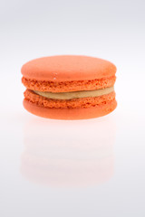 orange  macarons on white