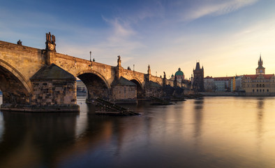 Morning view of Charles Bridge in Prague, Czech Republic. The Charles Bridge is one of the most visited sights in Prague. Architecture and landmark of Prague.