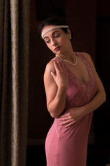 Pretty woman in 1920s flapper dress