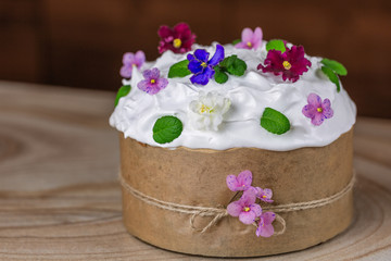 Sweet, traditional Easter bread, decorated with icing and flowers.  Kulich traditional