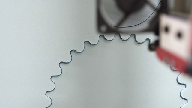 Hot wire CNC foam cutting machine, close-up moving shot of polystyren shape