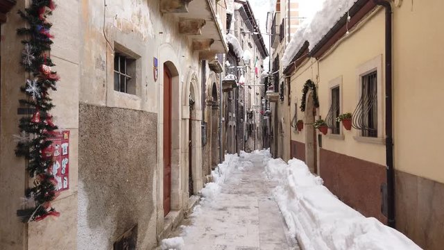 Pacentro covered in snow during winter season. Abruzzo, Italy.