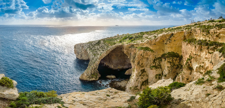 Blue Grotto, Malta. Natural stone arch and sea caves.