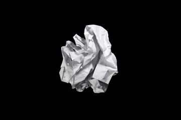 Crumpled paper ball isolated on a black background