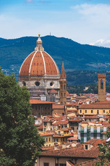 view of the Duomo of Florence with its characteristic dome designed by Brunelleschi