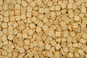 Cookies located on a flat surface occupies the entire area of the image.