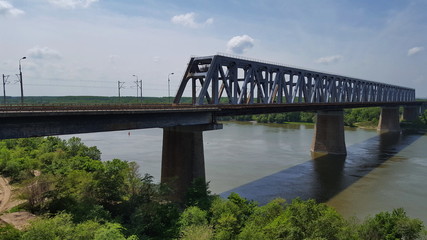 The Anghel Saligny Bridge (formerly King Carol I Bridge) spans the Danube near Cernavoda, Romania. may , 2017