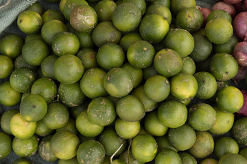 Fresh green tropical lemon on street market , phu quoc vietnam
