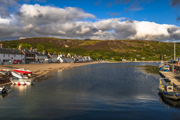Fototapeta premium City Of Ullapool With Old Fishing Boat At Loch Broom In Scotland