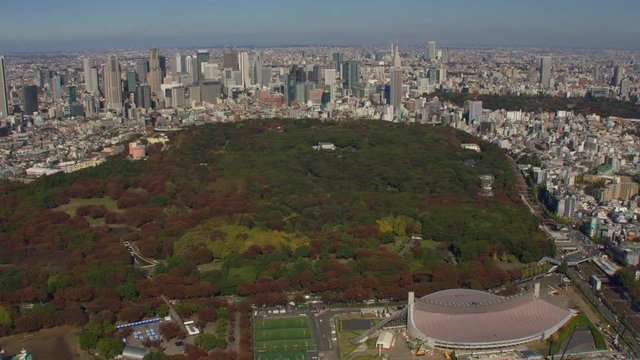 Tokyo, Japan circa-2018.  Aerial view of Yoyogi Park and Meiji Jingu shrine.  Shot from helicopter with RED camera.