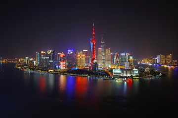 A night view of the modern Pudong skyline across the Bund in Shanghai, China