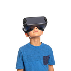 Young boy wearing virtual reality goggles 
