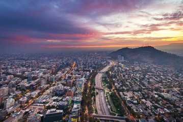 Fototapeta na wymiar Santiago aerial view with San Cristobal Hill and Mapocho River at sunset - Santiago, Chile