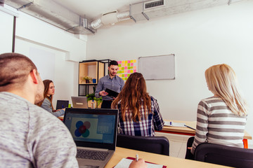 Fototapeta premium Students looking at their teacher