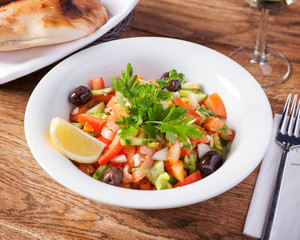 Arabic food, farmer salad - Delicious Coban Salatsi, beautifully arranged oriental, vegetarian dinner plate
