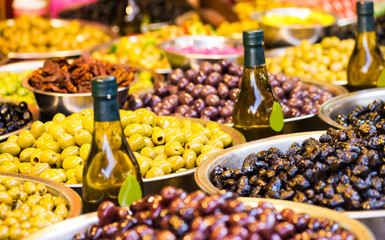 Background of olives close up. Fruit and vegetable market.  Selective focus