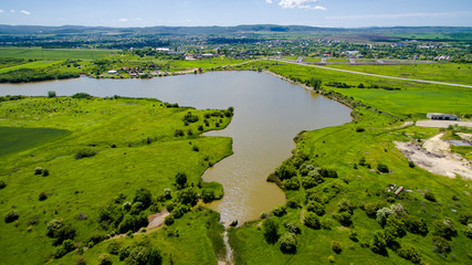 Fototapeta na wymiar lake on the plain from drone