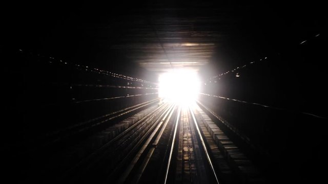 journey on the modern driverless Dubai elevated Rail Metro System. Subway leaves the tunnel, ahead is manifested futuristic views of Dubai architecture