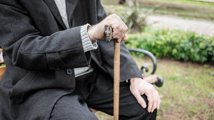 Old man sitting in the park