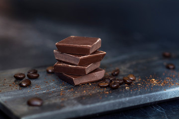 milk chocolate and coffee beans in kitchen for dessert making