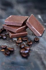 milk chocolate and coffee beans in kitchen for dessert making