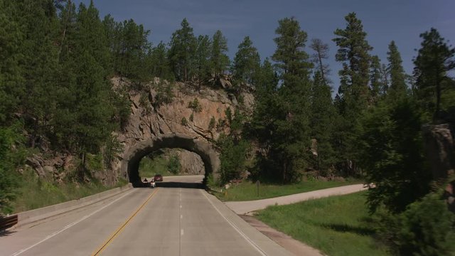 Keystone, South Dakota circa-2018.  Driving through tunnel in mountain outside of Keystone, South Dakota