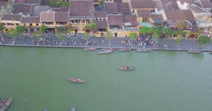 Aerial view of Hoi An old town or Hoian ancient town. Royalty high-quality free stock video footage top view of Hoai river and boat traffic Hoi An. Hoian is one of the most popular destination  travel